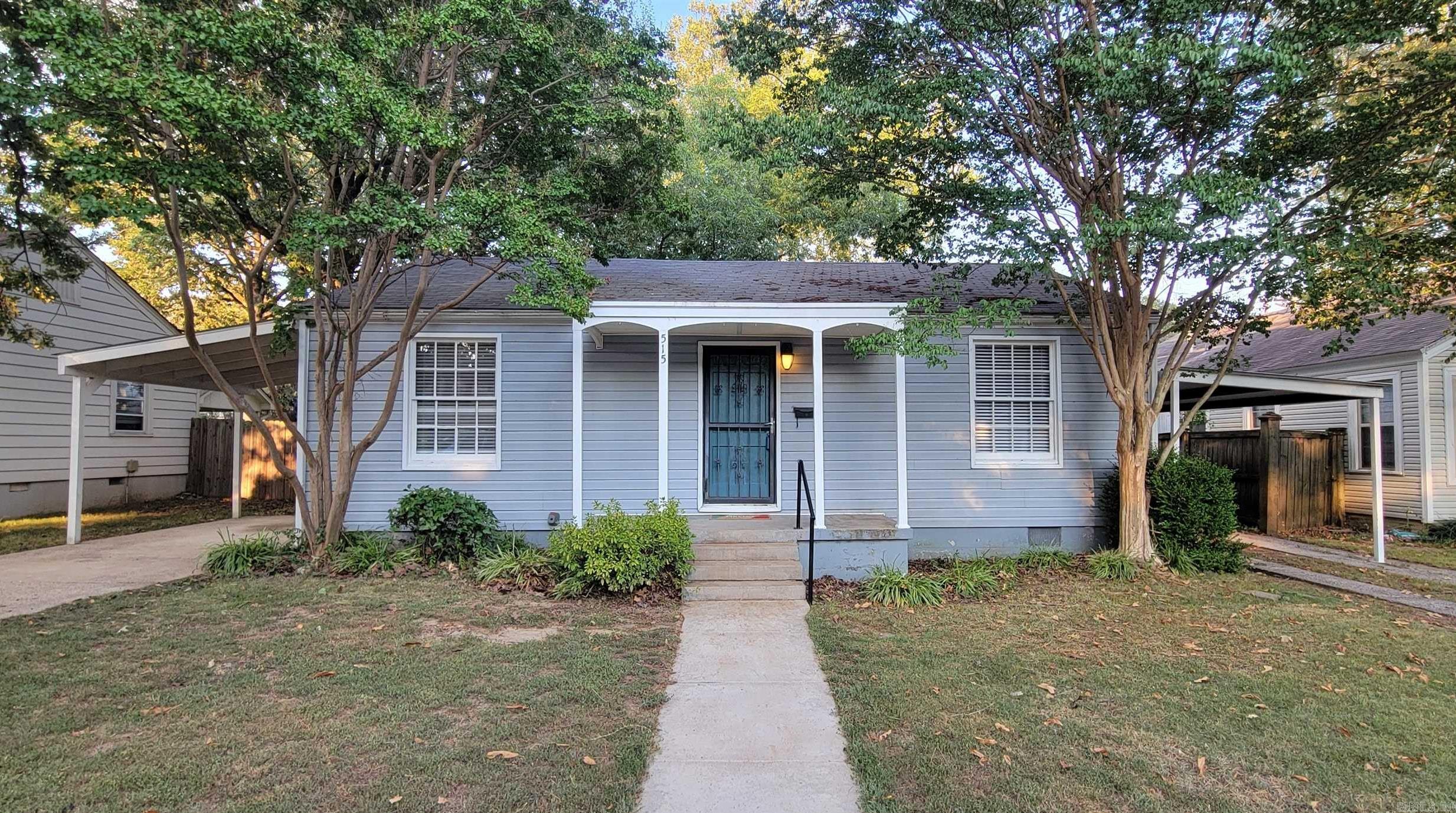 Welcome to this charming and affordable 2-bedroom, 1-bathroom home located at 515 N Fillmore, nestled in the highly sought-after Hillcrest neighborhood of Little Rock. This residence presents a fantastic opportunity for a first-time homebuyer or an investor looking for a reliable rental property. Step inside to discover hardwood floors that flow throughout the home, creating a warm and inviting atmosphere. The functional layout includes a large eat-in kitchen, perfect for casual meals, and a separate dining room for more formal gatherings. A large utility room provides plenty of extra storage with its additional cabinetry, making it easy to keep things organized. Outside, you'll find double driveways, ensuring plenty of off-street parking, each with a convenient covered carport. The expansive, flat backyard is a true highlight, completely enclosed by a privacy fenceāideal for play, pets, a garden or outdoor entertaining. The covered back patio offers a perfect spot to relax and enjoy the yard, rain or shine. This home is ready for its new owner and is priced to sell! Don't miss your chance to own a piece of this desirable community.