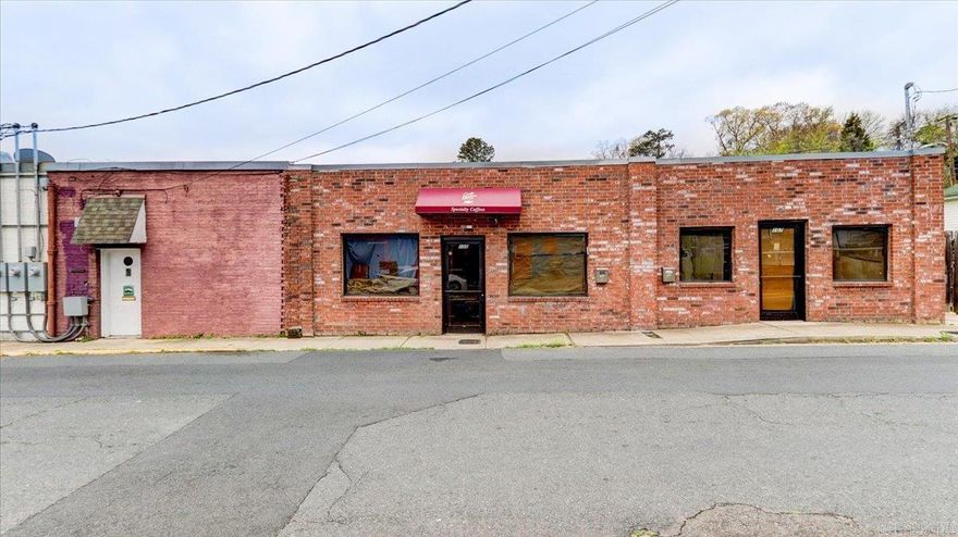 Great investment opportunity in The Historic uptown district of Park Ave. Investors take note of this "Opportunity Zone" commercial building.  This address is connected to 865 Park Ave but is a separate commercial location being offered.  865 Park and 105 and 107 Pullman are also being offered together under MLS #137924