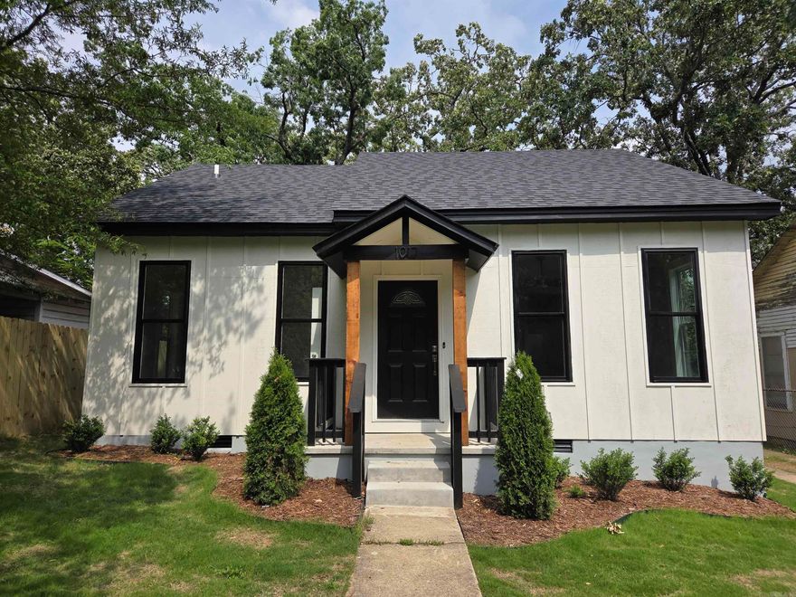 Completely updated/remodeled 3-bedroom 2 bath with extra large walk-in closet in the master. High 10 Foot Ceilings throughout home. Luxury planking throughout with tile in the baths, brand new kitchen with New Stainless-Steel Appliances. Natural Stone Countertops with room for a few bar stools along with separate dining area. Modern designed bathrooms with tiled bath/shower. Freshly painted interior- New energy efficient windows, brand new plumbing, brand new electrical, Completely brand new HVAC with new duct work, brand new roof. Extra large backyard with new 6 Foot Privacy Fence. The backyard has a New Deck and a separate extra-large parking pad with space for up to a very large Truck/SUV in the fenced in backyard. The front yard has freshly laid sod (new grass). The freshly planted very low maintenance evergreens and the overall modern design truly set the home apart from all others in the area.