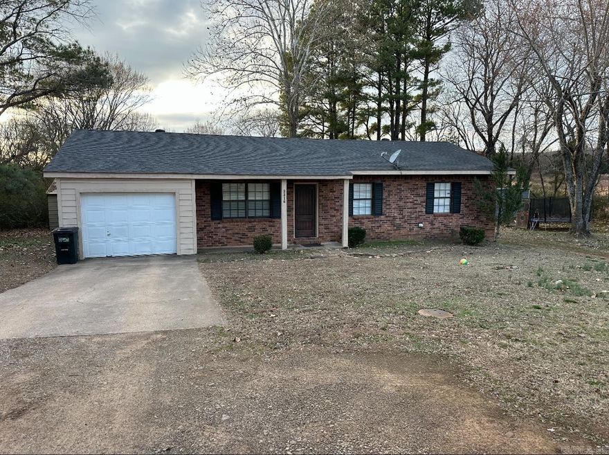 This 3 bedroom, 1 bath, ranch style home is conveniently located just outside the Clarksville city limits. This home has a laundry room, dining room, SPACIOUS closets in all 3 rooms, and 1 car attached garage.  Enjoy spending time outside in your large backyard. Relax and take in all the nature. Have a horse no problem, this property comes with an outbuilding with 2 horse stalls.