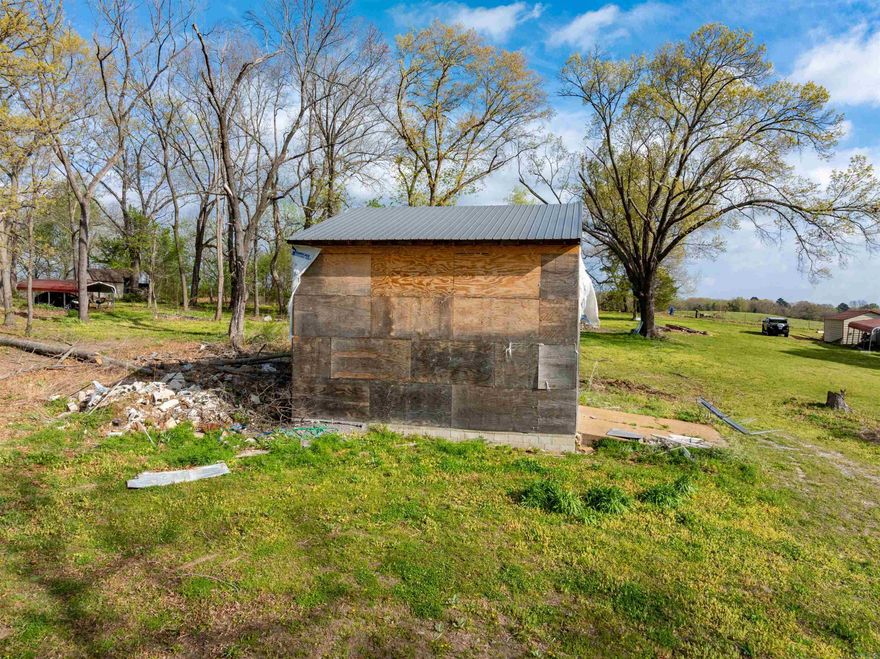 1.79+/- Acres with utilities, storage building and partially started home- Endless Potential!!  Looking for a property where the groundwork is already in place? This 1.79+/- acre parcel offers a rare opportunity to build your vision with key improvements already on site. PROPERTY FEATURES: 1.79+/- acres of open, usable land, 16x20 storage building with concrete floor--ideal for tools, equipment, or project space. Electric, water, and septic already on the property. Concrete slab foundation with a partially started home (not fully in the dry) offering a head start for your build.  IMPORTANT NOTE: Seller makes no claims or guarantees regarding the condition of the septic tank and only knows the approximate location. Why this property stands out: Whether you're ready to finish the existing structure or start fresh, this land gives you flexibility, space, and valuable utilities already in place. Perfect for someone wanting a project with a strong head start.