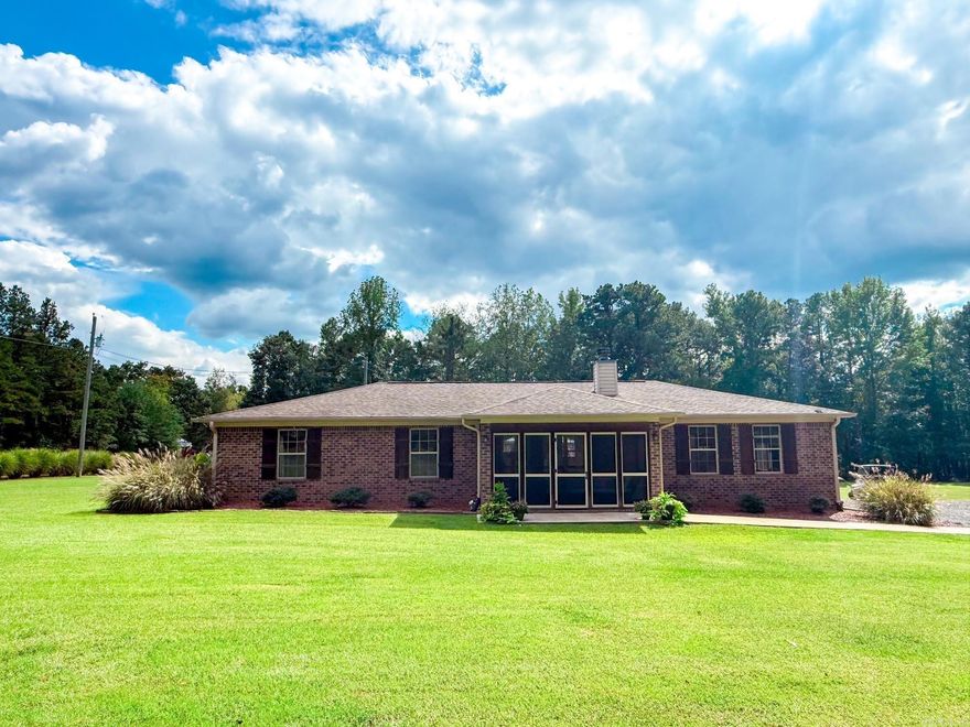 Welcome to your lake retreat! This 3-bedroom, 2-bath home sits on a beautifully landscaped yard full of Bermuda grass. From the moment you arrive, you’ll notice the charm and functionality this home offers both inside and out. Step inside to find a spacious layout with a large game room for entertaining, a roomy laundry room for convenience, and a cozy wood-burning fireplace that makes the living area feel warm and inviting year-round. The screened front porch is the perfect spot for morning coffee or unwinding at the end of the day, while the back patio and gazebo create a wonderful outdoor gathering space for family and friends. The property also includes a log cabin-style storage building that adds character and provides plenty of room for tools, lake gear, or hobbies. This could possibly be converted to a guest tiny home. With ample parking, you’ll have no problem accommodating boats, lake toys, or extra guests. Best of all, this home is just minutes from the sparkling waters of Greers Ferry Lake, with a neighborhood boat launch nearby. Whether you’re looking for a full-time residence or a weekend getaway, this property offers it all! Agents see remarks