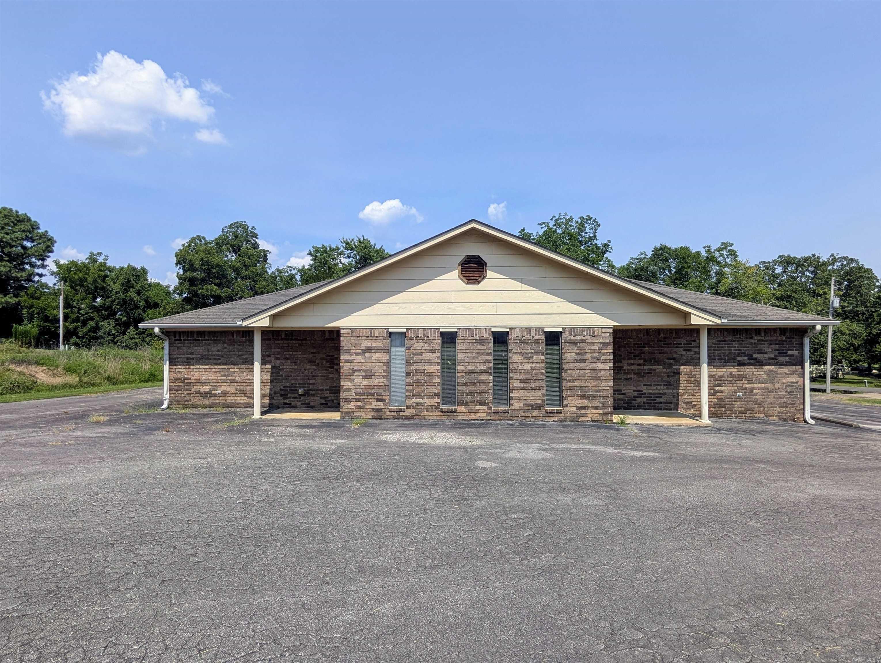 Perfect building for your new venture! Several rooms, front office, 4 bathrooms, x-ray room with leaded door/walls/windows and development room, security lights. So many potential uses!