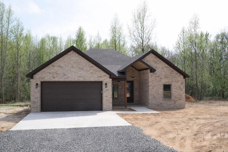 Check out this beautiful new construction just outside of Cabot! Featuring 3 bedrooms, 2 bathrooms, an open floor plan, and a roomy kitchen with a large pantry, this home is designed for comfortable living. Step out back and enjoy peaceful views of natural foliage, all while being just minutes from town and right off Highway 5.