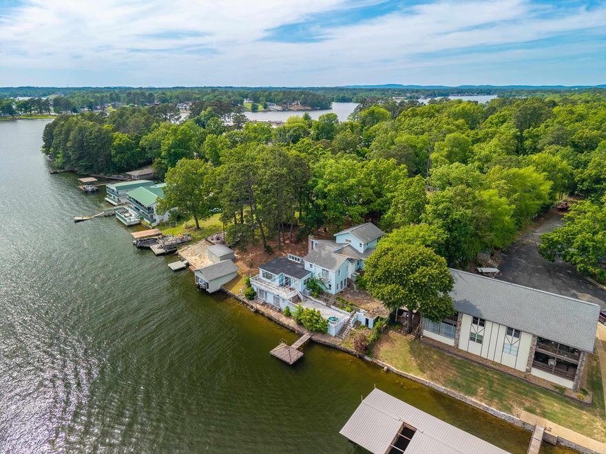 Prime Lake Hamilton Opportunity! This exceptional 1.38-acre lakefront property is located within the Hot Springs city limits and offers approximately 105 feet of frontage on Lake Hamilton in the desirable Burchwood Bay area. Conveniently accessible by both boat and car, the property currently features access from Waterside Lane, with additional potential access from Twin Points Road, as the lot extends nearly 600 feet to the rear. This home offers the option for a full renovation or removal, providing a blank canvas for developers or buyers looking to build a custom lakefront retreat. Surrounded by natural beauty, this property presents a rare opportunity to create a one-of-a-kind lake oasis in a prime location. A must-see property with endless possibilities, schedule your private showing today and explore the potential of this Lake Hamilton gem.