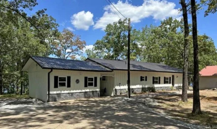 Welcome to your perfect slice of lake life in Greers Ferry—where peaceful waterfront views and everyday comfort come together beautifully. This charming 4-bedroom, 2-bath home offers approximately 1,970 square feet of living space, making it the ideal getaway, full-time residence, or investment opportunity near the lake.  Situated on nearly half an acre, this property is tucked along the shores of Greers Ferry Lake, giving you that true lakefront lifestyle buyers are always searching for. Whether you’re sipping your morning coffee overlooking the water, hosting summer weekends with friends, or looking for a high-demand lake property investment—this one checks all the boxes. Opportunities like this on Greers Ferry Lake don’t come around often—especially this close to the marina and with true lakefront access.