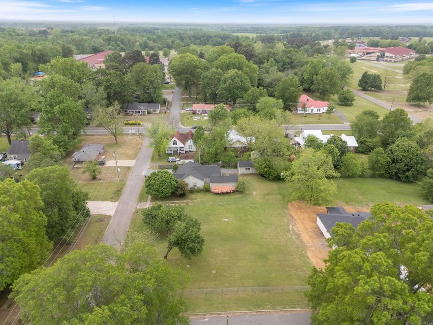 Each of these lots originally had houses but the two lots are now sold together with option of building on each lot or building one home occupying both lots. Building setbacks are 10 ft. on each side and 25 ft. front and back according to Beebe Code Enforcement. Both lots have partial fencing.