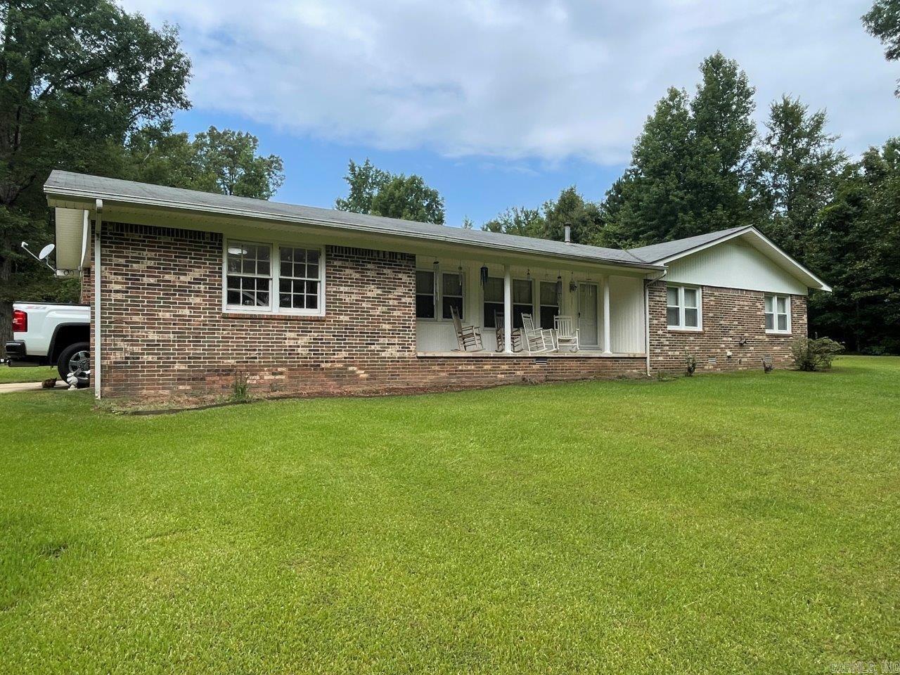 This is an extremely well kept 3 bedroom, 2 bath home, on a beautiful lot that is almost 2 acres. This beautiful home is in a great location near town. This property features a 2 bay shop that is heated and cooled. Features a fenced in area in the backyard.