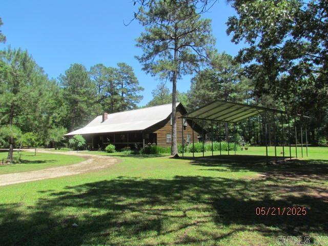Back on Market due to Contingency not working out for Buyer. Rustic 2-story Country Home featuring two sections: single family home(2560 sq ft)& attached in-law-suite(1140 sq ft). Home includes 4 Bedrooms, 2.5 baths, bonus room, sitting room, laundry room, walk-in pantry, spacious open living/dining kitchen, master suite features sitting room/office, full bath, walk-in closet, built-ins. Living area includes wood burning stove with with an amazing Native Arkansas Stone chimney/hearth built to the vaulted ceiling, open to kitchen with breakfast bar, dishwasher, stove, vent hood w Microwave, rustic cedar cabinets, refrigerator, laundry room with W/D. In-Law Suite includes own front/back door, single interior door access main house, open living/dining/kitchen, second wood burning stove, vent h, microwave, stove, bedroom, en'suite bath, zero walk-in oversized shower, laundry room, place for stackable W/D, central unit 6/24. Exterior home is Cypress, features large front and back porch with ceiling fans, cypress swing on front porch.40X50X12 shop has commercial red iron frame, 6ā fiber reinforced slab, 2 overhead doors, vehicle lift, ac unit.Septic system inspected/pump 12/24.