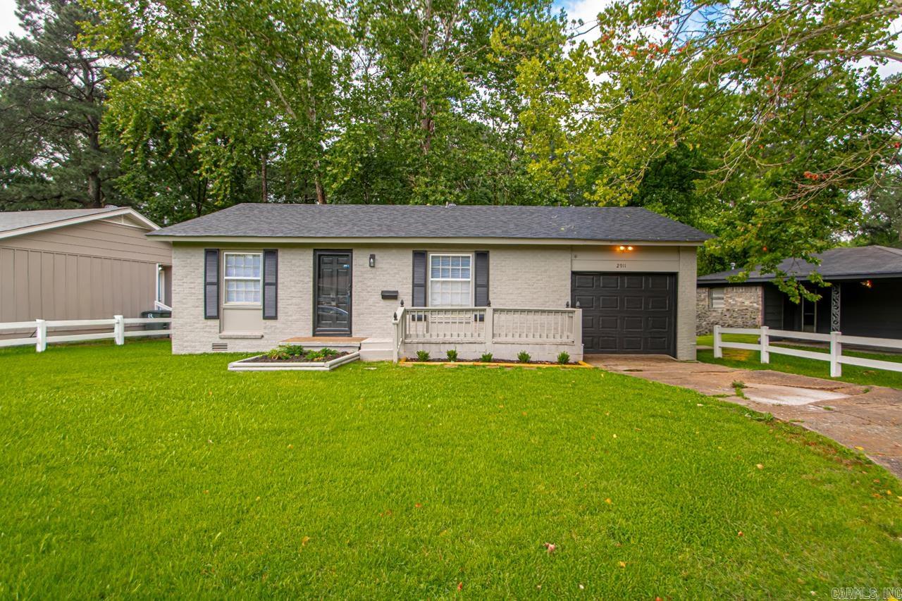 Come home to this charming remodeled home in the heart of Little Rock! Featuring a new kitchen with stone countertops, new cabinets and flooring, fresh paint, new hot water tank, new roof and fixtures, this home leaves little left but to enjoy! The cozy backyard backs up to a wooded area for added privacy.