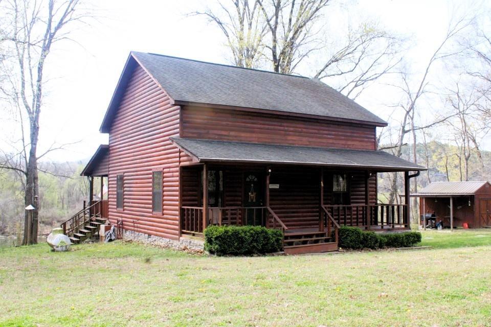 White River Retreat ā Calico Rock, AR | $399,000 No 025021 - This 3 bed, 2 bath, 1,288 sq ft riverfront home sits on a large 1-acre lot with stunning White River views. Built in 2008 and never flooded, itās fully furnished (most items included) and VRBO-ready or ideal as a personal getaway. Enjoy the gas log fireplace, central HVAC, all appliances, and two levels of cozy living. Relax on the front porch or spacious back porch with open deck overlooking the river. Steps lead down to the waterāfish right from your backyard! Located on a quiet dead-end road, the property also includes a detached storage building with side shed, a boat with motor and trailer, riding mower, and outdoor furnitureāall included for your river adventures. Turnkey and tranquilādonāt miss out!