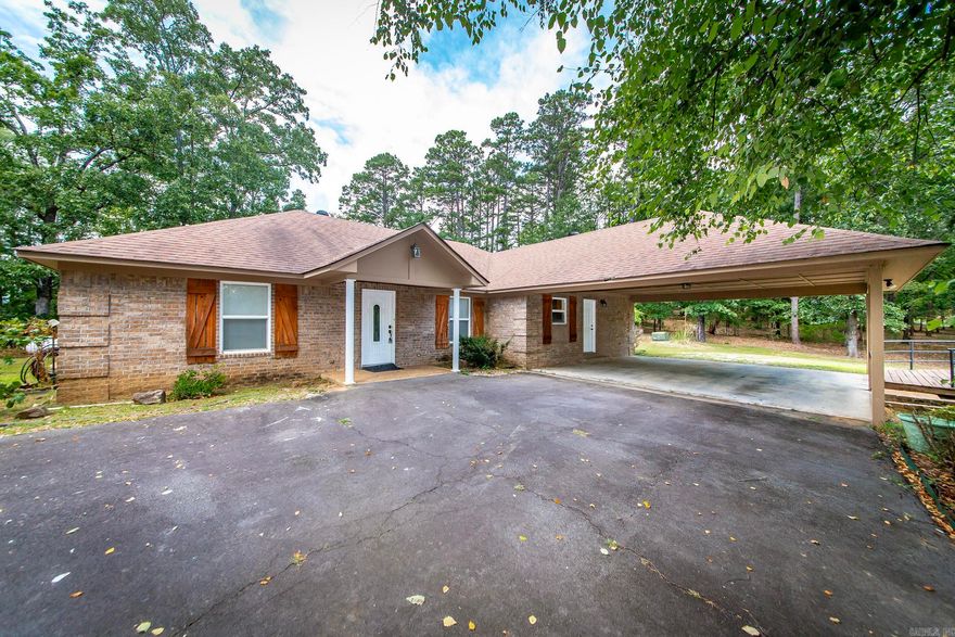 Experience the ultimate lakefront lifestyle with this beautifully maintained all-brick home, thoughtfully designed for effortless living and entertaining. Boasting an open-concept floor plan and a desirable split-bedroom layout, this property offers both comfort and privacy for family and guests alike. Enjoy gatherings in the expansive living spaces or step outside to your large, private yard—perfect for outdoor relaxation. The impressive 24’x30’ cooled shop building provides ample space for your lake toys, hobbies, and extra storage. For added peace of mind, a dedicated storm shelter is also included for safety during severe weather.  This property’s prime location puts you just moments from marinas and boat launch areas on Greers Ferry Lake, with two premier golf courses only 10 minutes away. There was previously an established path down to the lake; buyers will need to revalidate this access with the Corps of Engineers for future use.  This low-maintenance lakefront retreat truly has it all—schedule your private tour today!