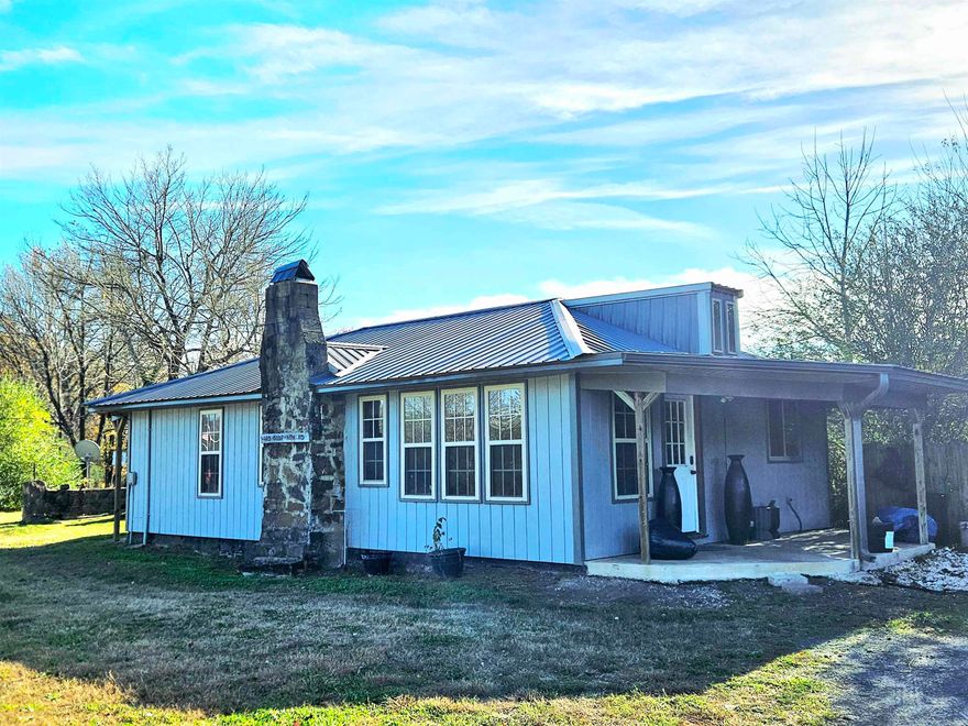 Nestled in the quiet little community of Scotland, this charming 864 sq ft home is the perfect blend of cozy comfort and Ozark character. Featuring 1 bedroom, 1 bath, and an extra bonus room that makes a great office or hobby space, this home is bright and welcoming with tons of windows, warm wood walls, exposed beams, and that classic cabin feel nightly-rental guests love.     The living area centers around a propane fireplace, and the home offers central heat and air, a metal roof, masonite siding, and a water well (public water available). It’s just under a mile to the friendly local Scotland store — a true gathering spot known for great food, country hospitality, and neighbors who treat you like family.      Located minutes from hiking, hunting, fishing, ATV riding, and peaceful country drives, this spot is ideal for weekend getaways. Its size, charm, and rustic interior make it perfect for a nightly rental or full-time simple living. Adorable, affordable, and move-in ready — come enjoy small-town Arkansas at its finest!