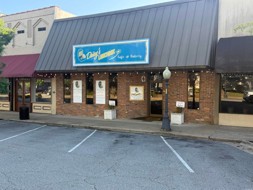 Don’t miss this rare opportunity to own a thriving restaurant located in the heart of downtown Searcy, Arkansas! Currently operating as Daisy’s Lunchbox, this well established business offers approximately 3,800 square feet of thoughtfully designed space with excellent visibility and strong local foot traffic. Surrounded by shops, offices and local attractions, this is a prime location with built-in demand. The interior features seating for approximately 60 guests, with room to expand. The building blends historic character with modern updates, creating a warm atmosphere that keeps guests coming back. The asking price of $365,000 is for building and land only. Agents, SEE REMARKS!