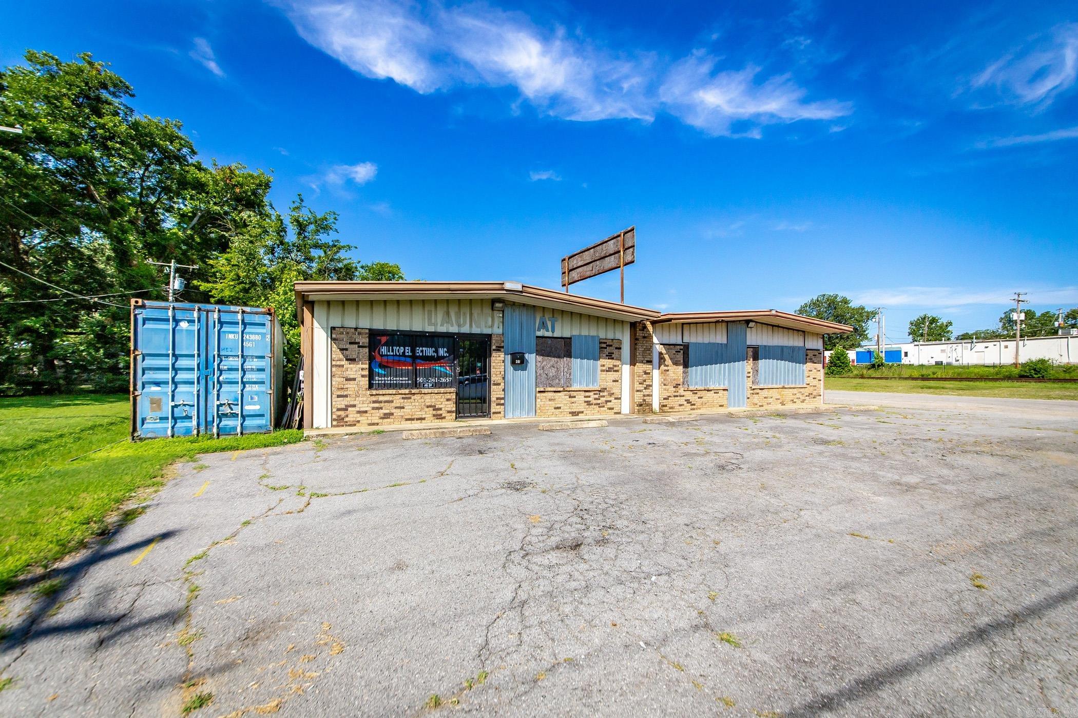 Turnkey Commercial Opportunity: Established Electrical Co. Location - Zoned C2! This 3,300 sq ft commercial property, strategically zoned C2 (Quite Commercial), presents an outstanding opportunity for your business! Currently home to a successful electrical company for over 18 years, this turnkey space is perfectly set up for continued operations or adaptable to a wide range of other commercial ventures. The building features a highly functional layout designed for efficiency, including three dedicated offices, a convenient kitchen area, a clean bathroom, and a generous warehouse space with a large roll-up door for easy access. You'll also benefit from a brand-new HVAC system, installed in 2024, ensuring comfort and energy efficiency. For those looking for a seamless transition, the existing electrical inventory and equipment are also available for sale with reasonable offers. Don't miss out on this prime commercial property, offering a proven location and an ideal setup for your next chapter! Square footage is approximate; measuring is encouraged.