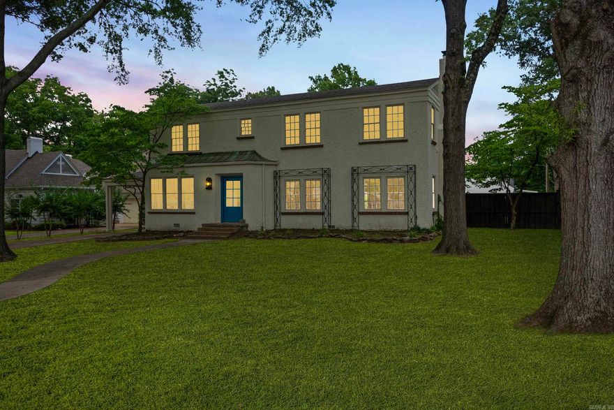 Charming Historic Character, Meticulously Restored! The gorgeous entryway and staircase is a fitting welcome to this delightful 4-bed, 3-bath Spanish Colonial. Beautifully renovated in the last year with a down-to- the-studs approach, new roof, plumbing, electrical, insulation, millwork, Kitchen, Baths, etc. Chic refinished oak hardwood is found in the entryway and living/dining areas, beneath a curated combination of stylish lighting paired with great natural light. The designer in you will find inspiration. The centerpiece of the sprawling living room is a wood burning or gas log fireplace with original mantel and marble. A multi-use bonus room is a plus! The kitchen is recently updated, and features quartz counters and premium appliances, configured for attractive efficiency. There's also a pot filler faucet over the 5 burner gas range. With luxurious tile clad walls, this culinary space looks like a catalog photograph. For sanctuary from the day, the updated en-suite primary bed/bath cannot be beat. The other 3 unique bedrooms offer the luxury of private space. The unfinished basement is useful for storm shelter. The portico carport easily parks two vehicles The large fenced ya