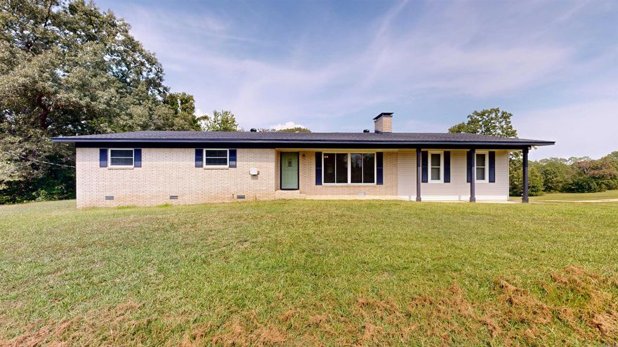 Charnimg Brick Home on approximately 5 Acres! This 3-bedroom, 2- bath home offers 1576 sq ft of comfortable living space and was built in 1965. Features include a 2-car garage, laundry room, and custome kitchen cabinets. Recent upgrades include a new roof (2023), new HVAC ( 2023), upgraded electrical, and fresh paint. Enjoy outdoor living with a covered deck and outdoor counter area comlete withits owns water heater, sink . Refergerator conveys with  the home. This property has a shop, with a covered storage area and dog run, and covered parking for a boat or RV.  Plenty of space to relax and enjoy country living.   Just a few minutes from Lake Degray.