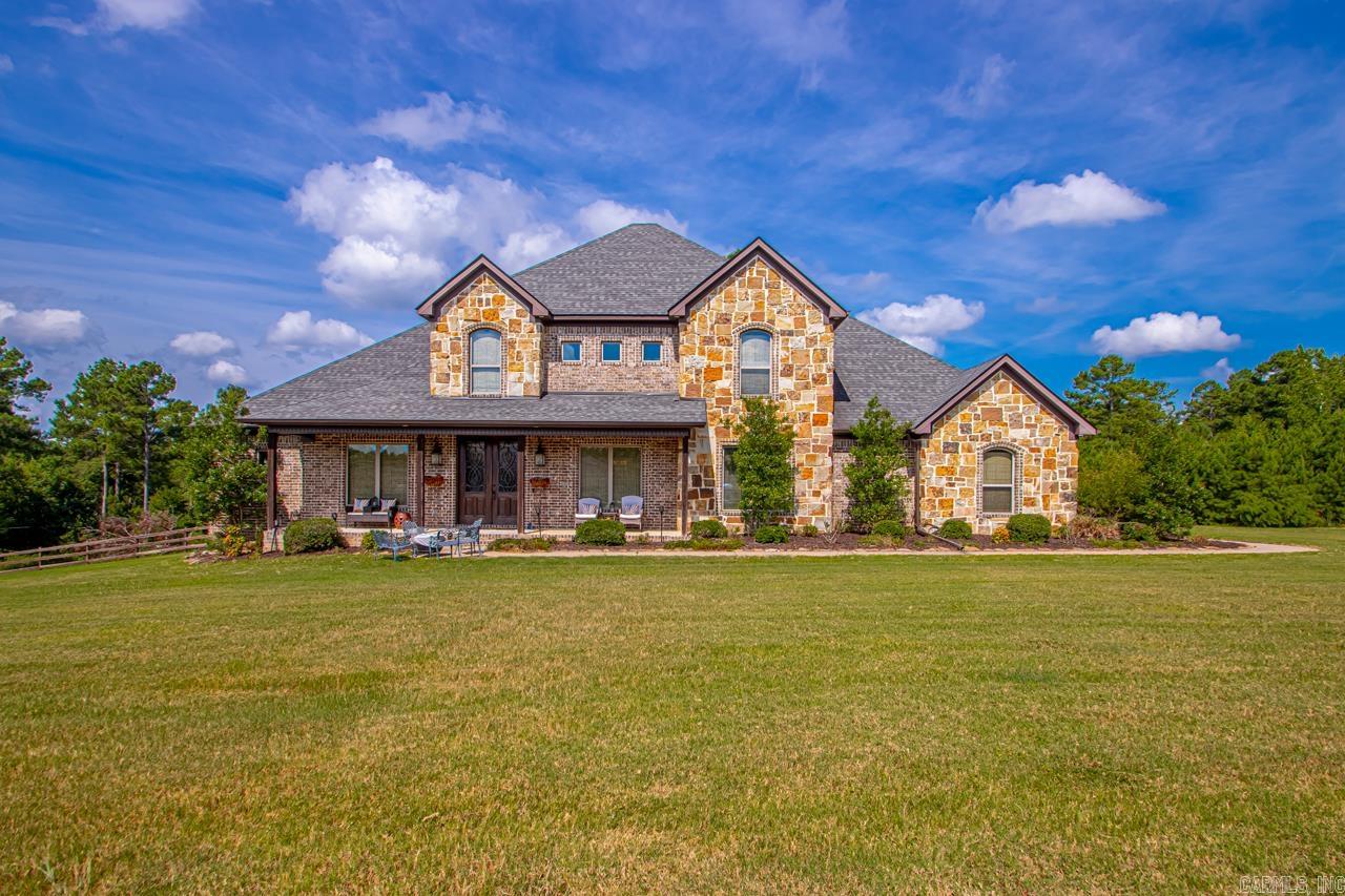 Corner lot in the desired Westcliffe subdivision just 10 minutes from Chenal. This house features 4 main level bedrooms, including a oversized master bedroom with generous bathroom and closet. Also on the main level is a formal dining room and dedicated office. Upstairs, you will find a large media room with an attached workout room as well as a full bathroom and bedroom. The attic features lots of floored storage. The entire 3 acres is fenced. The rear deck features a wood-burning fireplace and generous seating areas. There is also a whole house generator with a dedicated propane tank.