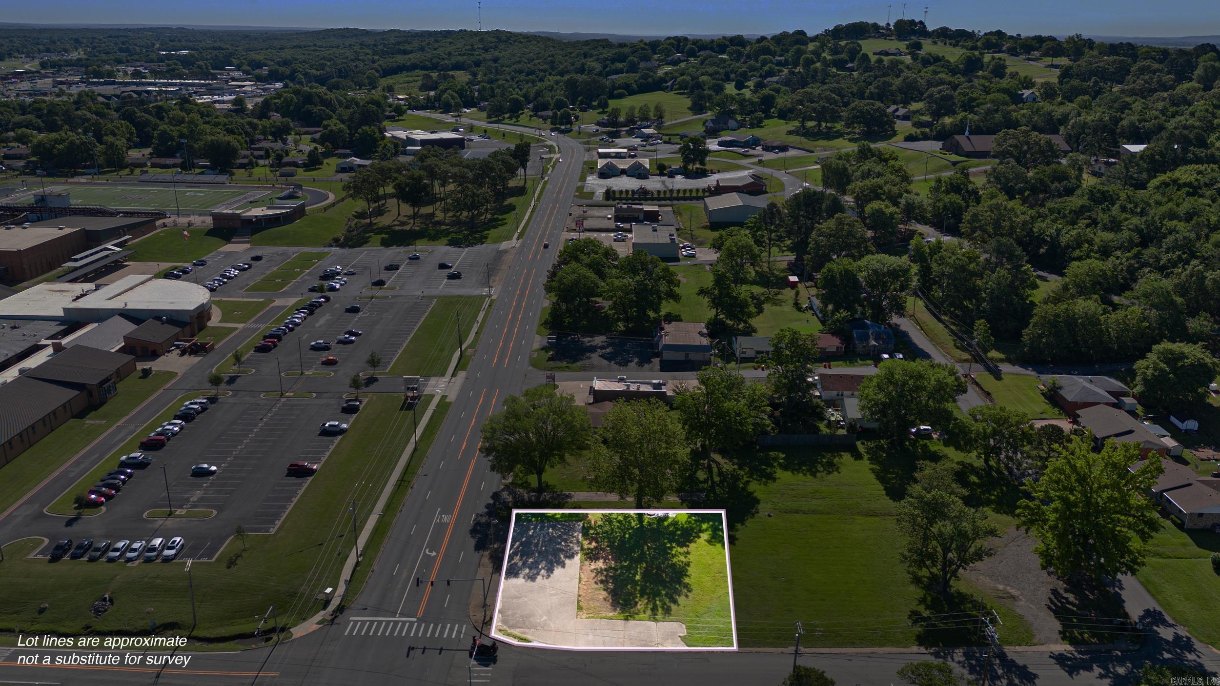 Prime Commercial Lot in Morrilton, Arkansas Incredible location directly next to Morrilton High School! Situated at the corner of Harding Street and Will Street, this premier commercial lot lies along the most highly trafficked corridor in Morrilton, offering unbeatable visibility and exposure. There are currently four available lots, and they can be purchased individually or in multiples to suit your needs. Whether you’re looking to launch a new venture or expand your existing business, this high-traffic location provides the perfect opportunity to maximize your reach and impact. Don’t miss this rare chance to secure prime commercial real estate in one of Morrilton’s most active areas!