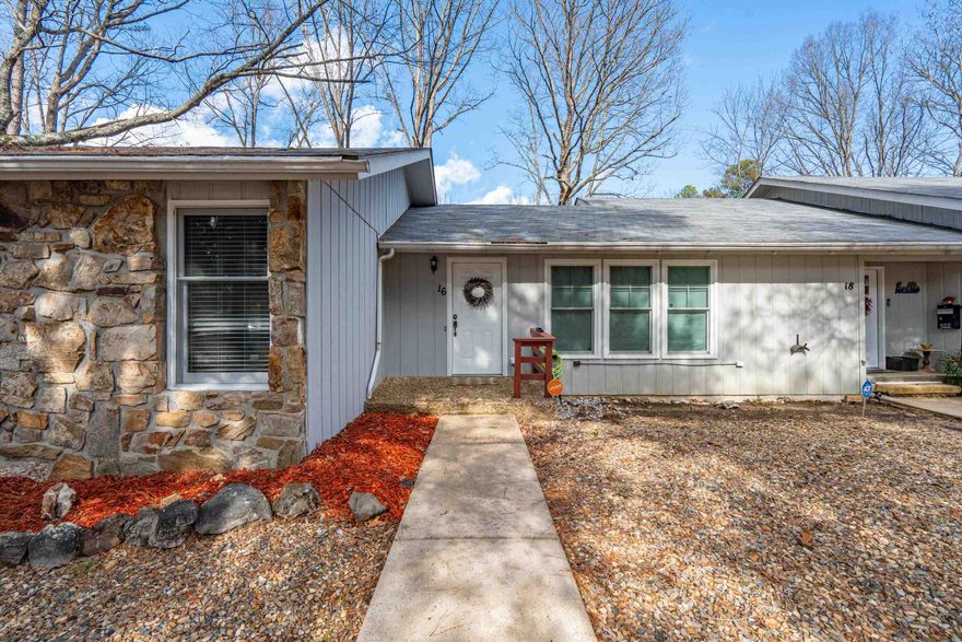 SELLER WILL PAY $2000 BUY IN FEE FOR FIRST TIME HSV BUYER AT CLOSING! Modern Living in one of the most convenient locations of Hot Springs Village! Just a short drive or walk to the Lake Desoto Marina, restaurants, golf courses, pickle ball, and the outdoor pool makes this a perfect home or vacation spot! 3 full bedrooms with an additional space for media room, office, crafting, storage, or a 4th bedroom space (no window!) Fantastic storage and many updates like smooth ceilings, updated lighting, fresh paint, and remodeled bathrooms! Primary bedroom and bathroom on main level and two decks adds to the benefits of this end unit! Don't miss out on your opportunity to see this one in person! Permanent residents qualify for a $500 homestead exemption! Affordable living at it's finest!