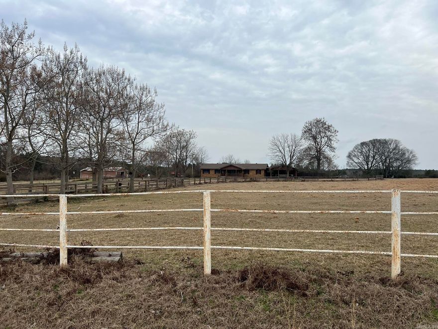 REAL ESTATE AUCTION!!! FRI, MAR 20th, 10:00AM - 31± beautiful acres in Sparkman! Discover the perfect blend of privacy, space, and rural comfort of this 2,390 sq ft, 3 bedroom, 2 bath home in Sparkman, Arkansas. Set on beautiful countryside, this property offers an opportunity for anyone seeking a peaceful homestead or multi use rural getaway. Located in a quiet area of Dallas County offering the serenity of rural Arkansas.   Property Highlights • 31± acres • 2,390 sq ft brick home • 3BR/2BA • Built: 1976 • Conventional foundation • Central heating and air • Horse barn/stables - 4 stalls - 45’x37’ • Storage shed - 20’x13’ with large lean to • Open side storage shed - 32’x24’ • Fenced loafing shed • Fully fenced  TERMS FOR THE REAL ESTATE AUCTION: • Must Have Proof of Availability of Funds to Register. • 10% Buyer's Premium added to bidder’s final purchase price. • Closing in 30 Days. • Sold AS IS, WHERE IS. • No Contingencies. • No Exceptions Will Be Made. • Earnest Money in The Amount of 10% - Preferably in the Form of a Cashier’s Check - Due Day of the Auction. • Announcements Made Day of the Sale Take Precedence Over Printed Material.