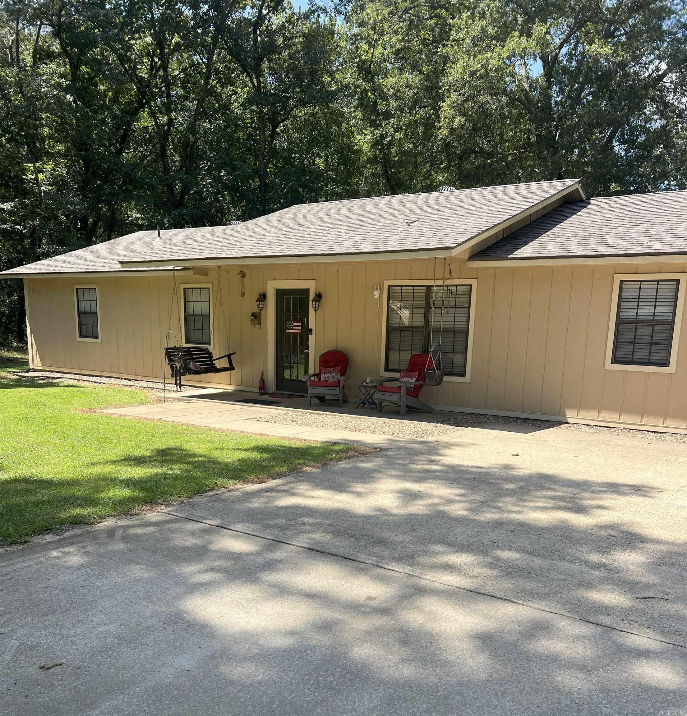 Very nice well maintained home on 2.5 acres inside the city limits conveniently located to schools and shopping, but a secluded sitting. Inside you will find 3 spacious bedrooms and four full baths. Newer carpet. Roof is only 2 years old. HVAC and HWH are all newer. This home has a fabulous 1200 sq ft shop with 10 ft doors, an apartment and additional living quarters. There is also a full RV storage with electric and a septic clean out. Additionally you will find 10 x 12 storage unit. The lot is level and manicured. This property is a rare find and you must see to appreciate all this wonderful property has to offer. Enjoy Conway Corp Electric