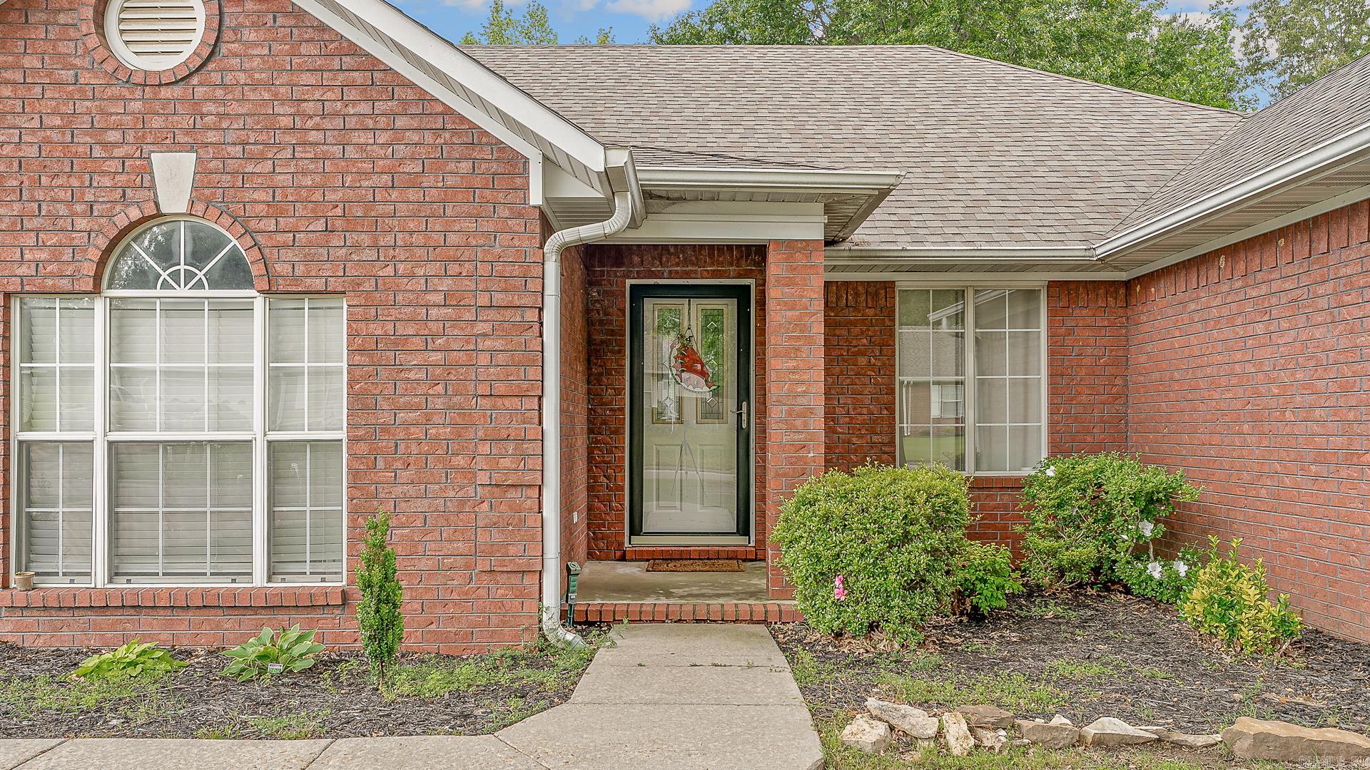 *OPEN HOUSE, Sunday June 22nd 12-2pm* This 4 bed, 2 bath, brick beauty on the west side of Paragould will knock your socks off! This house sits on approx a .56 acre lot so you know that privacy fenced back yard with it's mature shade trees is BIIIG. Throw the kids or pets out there and watch them from your comfy covered back porch, which is also perfect for your morning coffee or evening beverage. Plus, there's a site built workshop/storage bldg for all of your tools, toys, or secret hideaway plans. Inside? equally as good. Living room? Large with cozy gas log fireplace. Kitchen? Soooo many cabinets, so much counter work space. Lots of room to lay out that fast food buffet you bring home for dinner. Eating areas? Well, there are 2 options to enjoy those delicacies, the breakfast area in the kitchen or the separate dining room. When the food coma sets in, everyone will have their own space to retreat to within this split plan layout. The Primary bedroom is spacious and the 4th bedroom is oversized. It would be a great space to make a play room, 2nd living area, or guest room. New roof and water heater installed in 2023. EV outlet equipped garage. Priced well below recent appraisal!