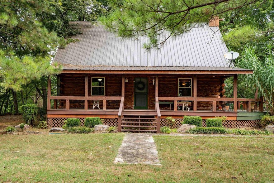 Escape to the White River with this charming 2 bed, 2 bath waterfront cabin on 4 acres in Batesville, AR. Nestled in a peaceful setting, this home features a welcoming entrance, cozy wood stove, and screened-in porch overlooking the water. Enjoy excellent fishing, abundant wildlife, and quiet surroundings while still being just minutes from town. Perfect for an outdoors-loving family seeking comfort, beauty, and convenience all in one.