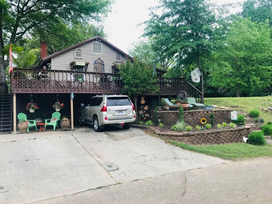 219 S 1st St in Augusta is a uniquely charming property offering stunning RIVER VIEWS from the front deck and a secluded private oasis in the fenced back yard. The seller has taken care to upgrade and maintain the property with 2017 renovations including new central heat and air, durable and pet-friendly bamboo flooring, and whole-home security system. A new metal roof was added in 2020 as well. The beautifully landscaped back yard features a wooden pergola and cozy seating area perfect for hosting friends and family, providing a phenomenal space to enjoy all types of outdoor entertaining. In addition to their striking architectural detail, gorgeous coffered ceilings supply distinctive touches of warmth and character throughout the interior of this one-of-a-kind home. An efficient stackable washer/dryer is conveniently housed in the spacious full bath and will convey along with all kitchen appliances (all purchased in 2017).