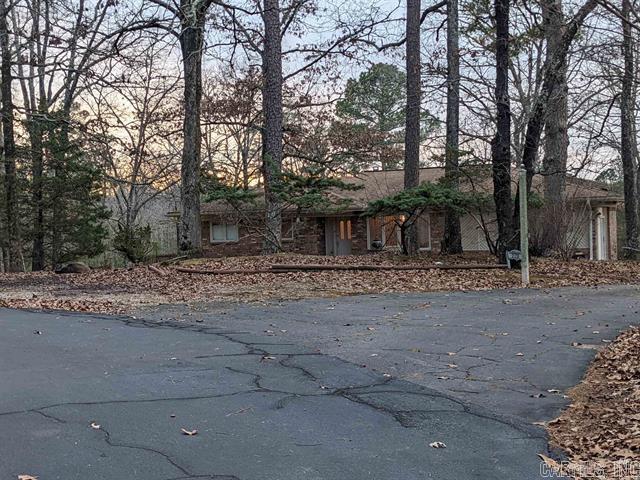 Beautiful private wooded setting. Watch the sunset on 6.02 acres of rolling woods. Make this property your own oasis by renovating to your taste and for your desires. You can change the house but not the location and this location is peaceful and amazing. Lovely sun room with downstairs 3rd bedroom, bath and kitchenette for an in-law suite or guest quarters. 2 washer/dryer hookups. Enclosed garage is laundry room and could be 4th bedroom. The potential and options of this property are endless. If you want privacy and instant equity this is the home for you! Call today for a VIP showing! Agents see agent remarks... Note: Arvest employees, directors and their family members are ineligible to purchase Arvestās bank-owned properties. Sold "as is"