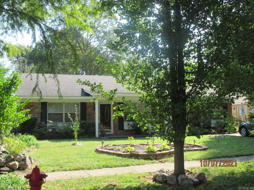 This beautiful, well-maintained home is a must see! This property is located in a prime location in close proximity to shopping and work. The fourth bedroom can very easily be converted into a second living room. The backyard is perfect for entertaining. There is a huge separate building with electricity in the backyard that would be a great workshop or could be converted into a guest house. Schedule a tour today!