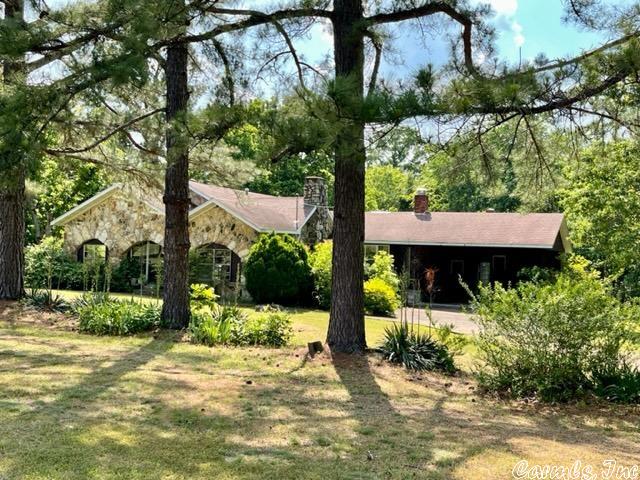 Rock Solid in the Heart of Ash Flat...30 Acres+-With home being surveyed. We know you want to preserve a part of history, where cotton was grown and only steps from the old school house & gym. Prime to subdivide and/or restore the beautiful character of the 2,300 sq.ft. rock & frame home. Needs lots of attention, while you truly have features of another era from the floors to the doors. Multiple living options with several rooms, enclosed front porch, fireplaces and 2 baths. Reclaim the garden, enjoy the flowers, sit in the shade and enjoy a homestead of generations.