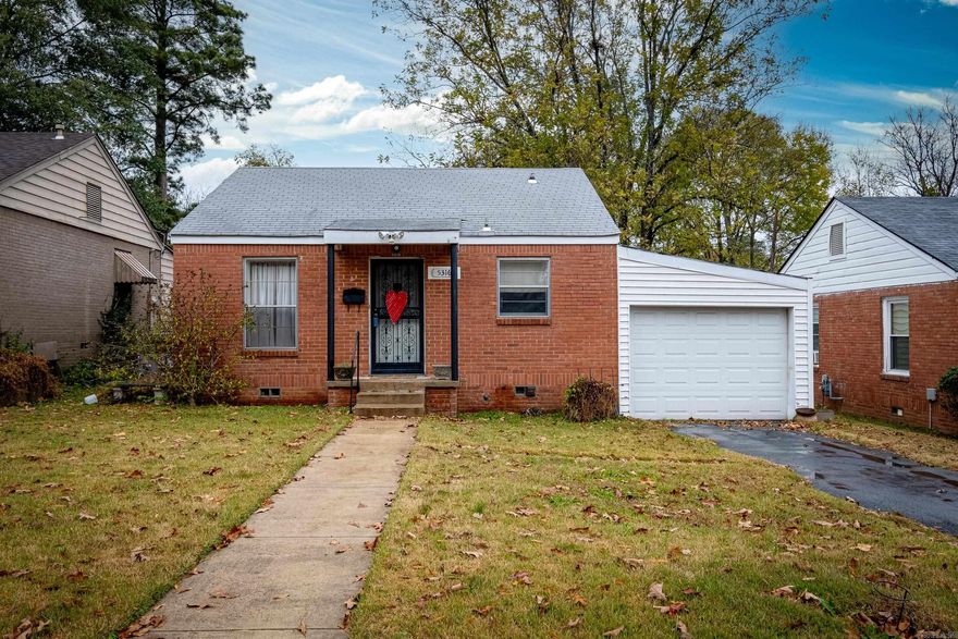 Great investment property in this one owner home.  Owned for 76 years.  Lovingly added on as the family grew.  Original home consisted of a kitchen, one bath, a living area and 2 bedrooms.  In later years the kitchen was expanded and another bedroom and living area was added.  Still later an additional 390 s.f. of space was added to the back of the house which includes a large living/work/sleep area as well as a full bath including a whirlpool tub. This area can easily be made into a bedroom as there is space for a large closet to be added. Entry into that area is either through the attached one car garage or through a separate entrance from the backyard.  The 390 s.f. is not included in the square footage.  In essence the home has three living areas (one of which can easily be turned into a bedroom as there is a space for a closet.  This space is large enough to be a bedroom/living combination) and 3 full baths.  Might be perfect for 3 med or law students.  Washer, dryer and refrigerator convey. Hardwood floors under all carpeted areas. Property sold as is.  Agents, see confidential remarks.