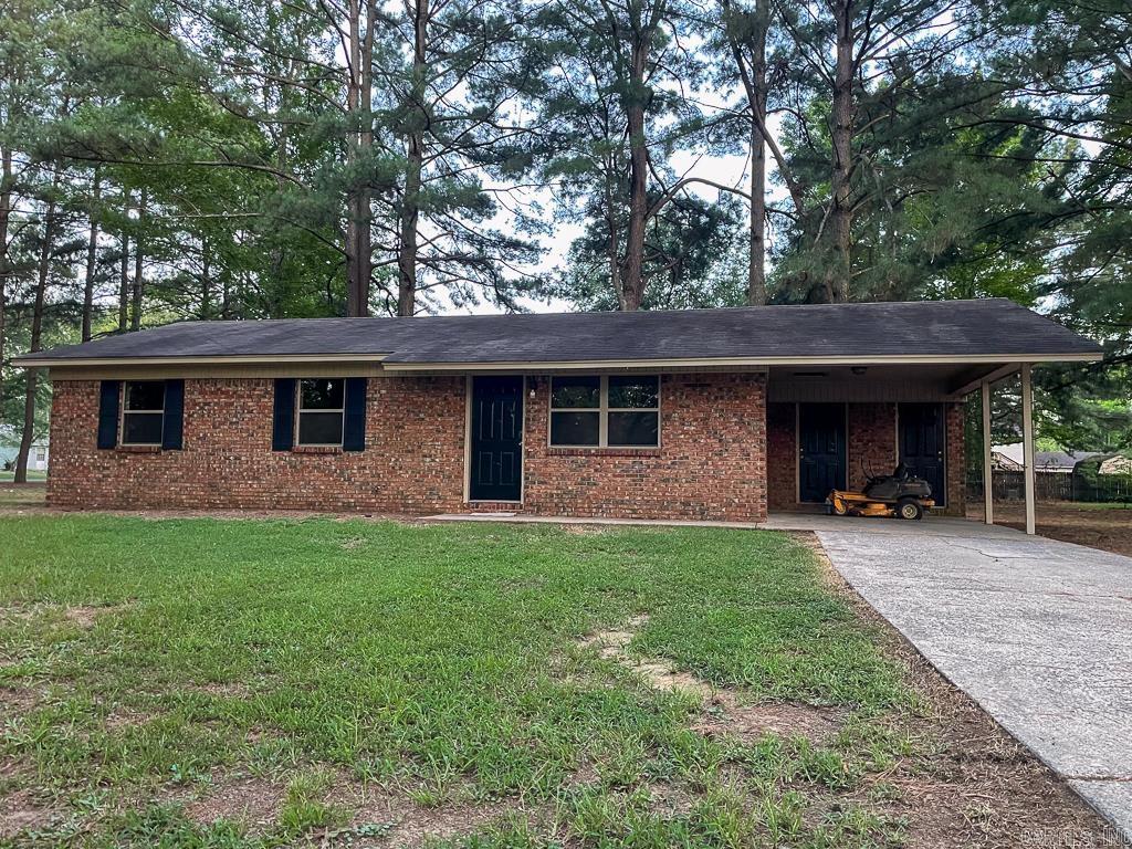 Solid 3-bedroom, 1-bath brick home on a large corner lot in Greenbrierās East Side Elementary area. Built in 1981 with 1,028 sqft, this home features solid surface flooring throughout, fresh interior paint, tile countertops in the kitchen, new water heater, and dishwasher. Single-car carport with storage closet. Mature trees and a spacious backyard offer great outdoor space. Move-in ready and would make a great rental. Property will be sold as-is. All windows, roof, hvac, and sheetrock replaced at the end of 2010.