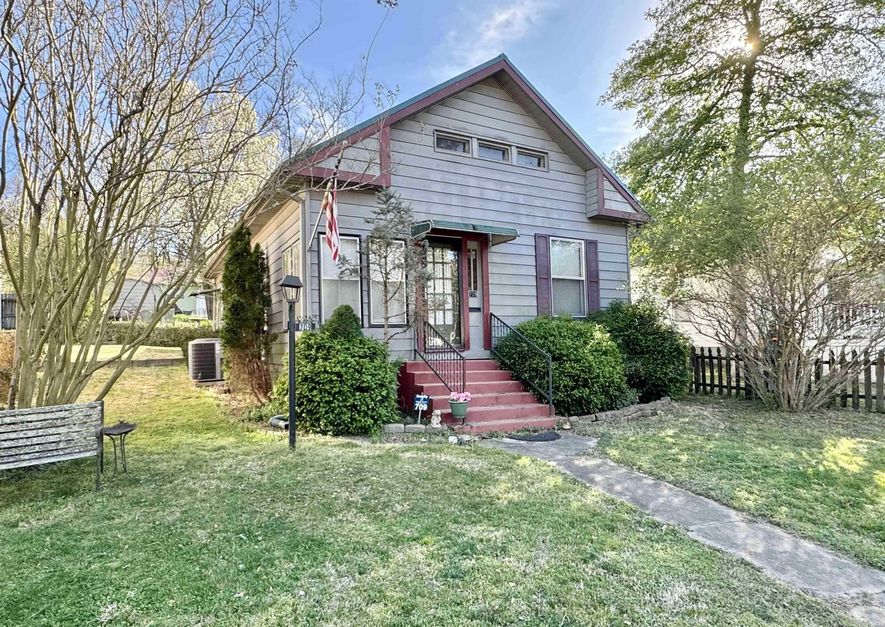 Attention investors! This 3BR/1BA bungalow is located along Whittington Avenue, directly across from Whittington Park and within walking distance of downtown Hot Springs. Very prime short term rental area! The property is zoned commercial transitional so it is not subject to the city's cap on short term rentals. The new buyer could easily convert this to an Airbnb. Nice deep lot with access to two streets - parking in the rear. New metal roof and new HVAC. The house needs some cosmetic updates but nothing major. Don't miss the rare opportunity to purchase a home on Whittington Avenue!
