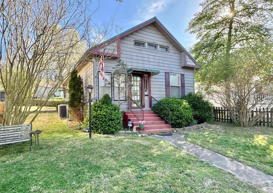 Attention investors! This 3BR/1BA bungalow is located along Whittington Avenue, directly across from Whittington Park and within walking distance of downtown Hot Springs. Very prime short term rental area! The property is zoned commercial transitional so it is not subject to the city's cap on short term rentals.  The new buyer could easily convert this to an Airbnb.   Nice deep lot with access to two streets - parking in the rear.   New metal roof and new HVAC. The house needs some cosmetic updates but nothing major.  Don't miss the rare opportunity to purchase a home on Whittington Avenue!