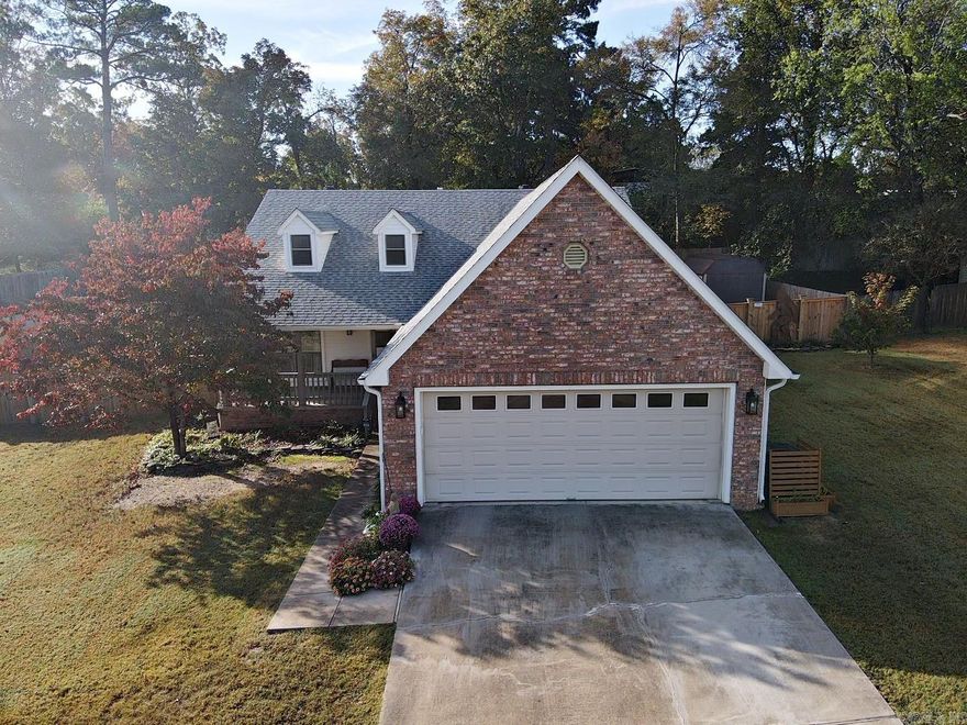 Move in ready home in a quiet neighborhood, only a few steps from Lake Hamilton with deeded lake access and boat launch. This three bedroom, 2 bath home is in Lakeside School District and minutes from historic Hot Springs National Park. Vaulted ceilings, cozy fireplace, fully fenced backyard with decks for outdoor entertaining are just a few attributes to this beautiful home.  New storage building, HVAC, windows, granite countertops, 6' privacy fence, roof and gutters, LVP flooring are recent upgrades.