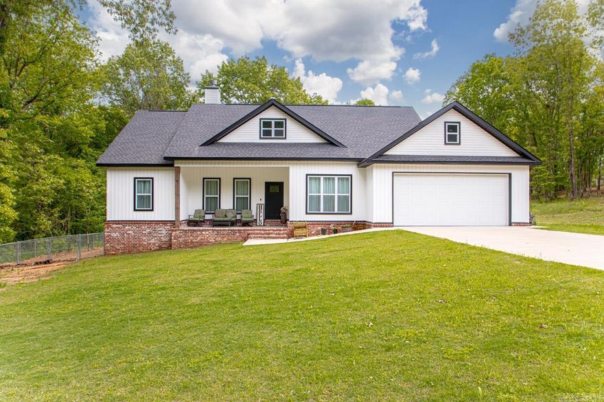 LOVE PORCHES??  This is your house!! This custom home built with a farmhouse style is absolutely stunning. Located in one of the most well desired neighborhoods in East End. (Springwater) Home has 4 bedrooms with 2 full bathrooms. Split plan. One bedroom is off the living room that could be an office as well. Woodburing brick fireplace with mantle. Open Kitchen, Living Room and Dining area. Open island with additional seating. Wall oven and microwave. All electric home. Custom tile shower in primary bath with a separate soak tub. Double vanities and huge walk in closet in the primary sweet. Large laundry room off the garage entrance and large walk in pantry. The back porch is stunning and has a great back yard for cookouts, pets or just playing. Very private backyard with woodbine behind the home. You will not want to miss out on this home less than 2 years old. Please see remarks!!