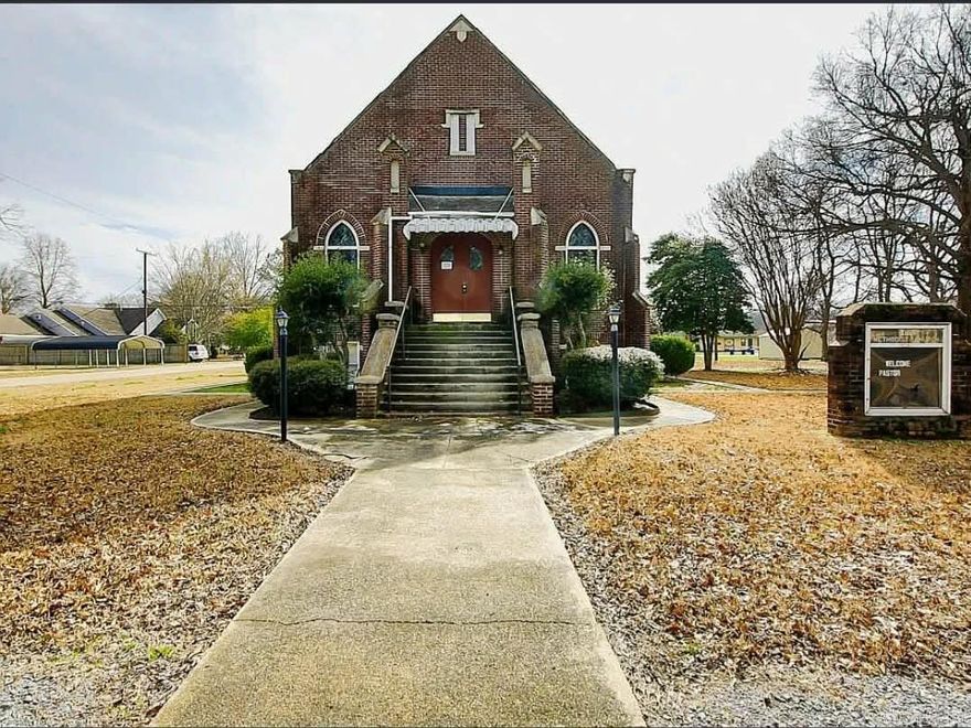 This unique property is a 1920's Victorian style church zoned residential. It has stained glass windows, cathedral ceilings, 8 individual rooms, a basketball court that could be turned into a garage/carport, has radiator heat, hardwood floors, a massive attic that could be turned into a loft, basement, & has a full kitchen. This could make an excellent Airbnb, group home, multi-family home, event center or venue. The possibilities are endless, bring your visions!  * No owner finance, no rent to own, sold as is. *