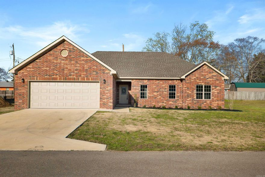 Brand new construction in Lake City, AR! This beautiful 3 bedroom, 2 bathroom home features a spacious open living area with a cozy gas fireplace perfect for relaxing or entertaining. The kitchen offers granite countertops and stainless steel appliances. It also has a large pantry and breakfast bar area with plenty of room for gathering. The master suite includes two walk-in closets, double sinks, a tiled walk-in shower, and a convenient linen closet. Situated at the end of the street in a quiet cul-de-sac, this home provides a little extra privacy while still being close to town. Don't miss the opportunity to own this stunning new home!