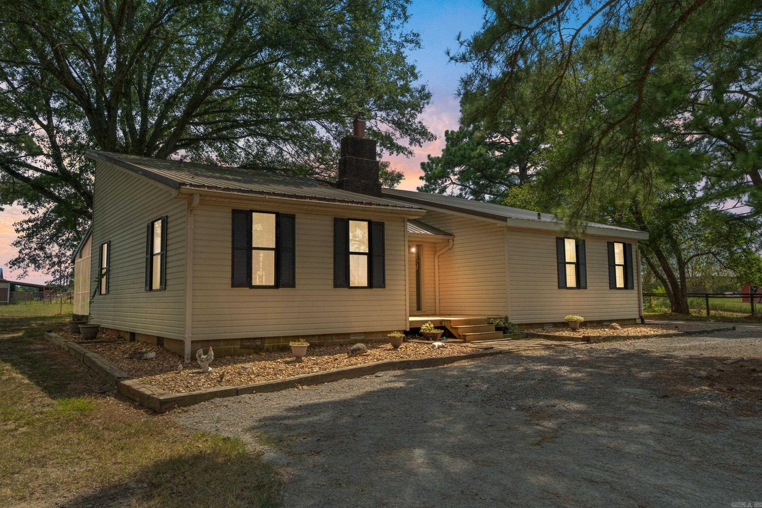 Discover the perfect blend of modern updates and timeless country charm with this beautifully renovated homestead on just under 5 acres of fully usable land. Thoughtfully upgraded in 2024, the home features brand-new floor joists and new flooring throughout the main living areas, ensuring long-term comfort and structural integrity. Set against a peaceful rural backdrop, the property offers everything needed for a self-sufficient lifestyle or a quiet country retreat. Three barns provide flexible space for storage, animals, or hobbies, while multiple fenced lots are ideal for livestock or horses. A private, stocked fishing pond adds a serene touch and invites you to enjoy peaceful afternoons outdoors. The screened-in porch is perfect for relaxing or entertaining year-round, offering a comfortable spot to enjoy the views and fresh air. Whether youāre sipping morning coffee or gathering with friends, itās a standout feature of this inviting home. With plenty of room for gardening, animals, and recreation, this non-cookie-cutter property supports a variety of homesteading goals, all while offering convenient access to nearby amenities. Don't miss your opportunity to call this home!