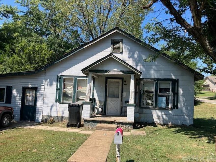 This 2BR/1BA home is awaiting your creative touch. Located in a quiet neighborhood on a level lot. While this home is in need of renovation, it does offer spacious rooms and also a bonus room that could easily be a third bedroom. See Agent remarks.