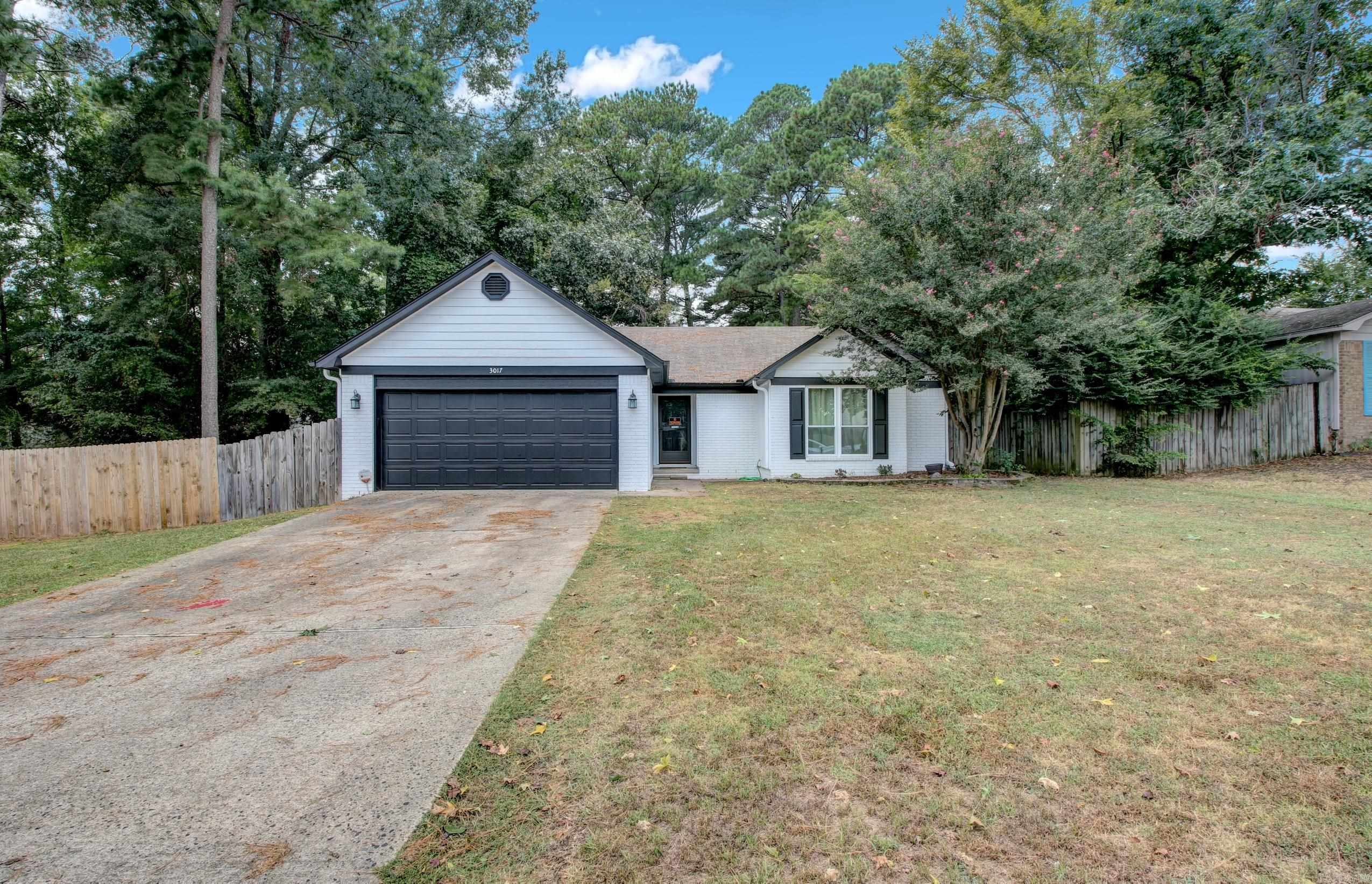 Beautiful Curb Appeal in Bryant School District and all for under 200k. This three-bedroom, two-bathroom home has a big open floorplan and a lovely wide-open living area that leads to a great deck and large backyard perfect for entertaining. This home is located in the heart of Bryant and convenient to everything...shopping, dining and I30 access to name a few. The private areas include three spacious bedrooms and a nice primary suite with a large walk-in closet. The dishwasher, microwave and garbage disposal were recently replaced. Come check out the convenience of this neighborhood.