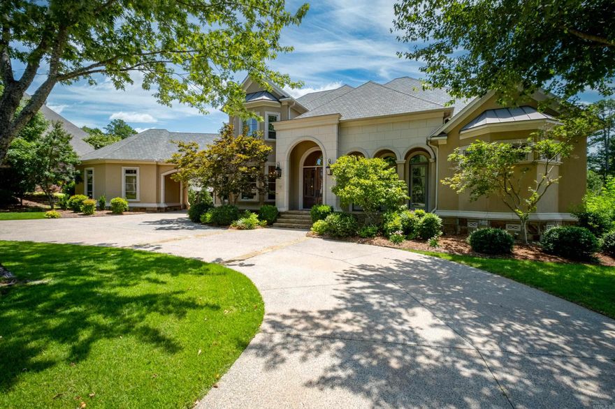 Located on a 1/2 acre lot on the Bear Den golf course. One-owner home custom built by Kevin Hughes.. Enter through the porte-cochere to access garages. Welcoming entry invites you into spacious Living & Dining areas with custom crafted iron doors opening to an attractive Wet bar & Wine storage cabinets. Travertine flows through the formal areas to the Kitchen-Keeping room ( Island/breakfast bar, breakfast room & family room w/ 2nd fireplace) ideal for less formal gatherings. Appliances include Sub-Zero refrigerator,, built-in wall ovens, 6 burner gas cooktop, dishwasher, ice maker & wine cooler. Step out to the private patio w/ water feature and view of the course. High ceilings & walls of windows provide an abundance of natural light in this home. Spacious Primary Bedroom w/ 2 walk-in closets & elegant Bath. Separated 2nd BR & B on main level plus an Office/TV room, Guest Powder Bath & Laundry room. Upstairs you will find an Exercise room, 2 Bedrooms, 2 Baths, a cozy Seating Area plus a Bonus room w/wet bar w// refrigerator. Enjoy the spacious backyard/view of the course from the upper balcony. Elegant yet warm & welcoming home in a most-desirable gated community. Rare find !