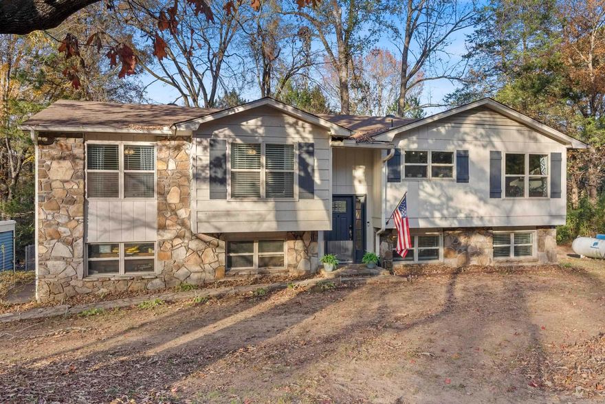 ***SELLER OFFERING $5,000 CREDIT TOWARDS BUYERS CLOSING COSTS*** Nestled in a desirable, quiet neighborhood on nearly 2 acres near Beaverfork Lake! This spacious home has a lot to offer with a ton of updates/upgrades including real wood floors, granite kitchen counter tops, stainless steel appliances, remodeled full bathrooms including jacuzzi tub with subway tile to the ceiling and new tall shower head, NEW interior paint, NEW carpet in 3 bedrooms & stairs, NEW back roof with whirly birds, NEW HVAC w/ transferable warranty (1.5 yrs old), NEW 12x30 storage building w/ 2 lofts, NEW back deck stairs & stain and NEW septic lines. Relax or entertain on the large wood deck that overlooks the huge fenced backyard. Kitchen refrigerator, 5 tv mounts, AT&T security system, Ring doorbell & camera, storage building & survey included. Fiber internet included and homeowners have exclusive access to private park and dock on Beaverfork Lake. Won't last long! Agents see remarks.