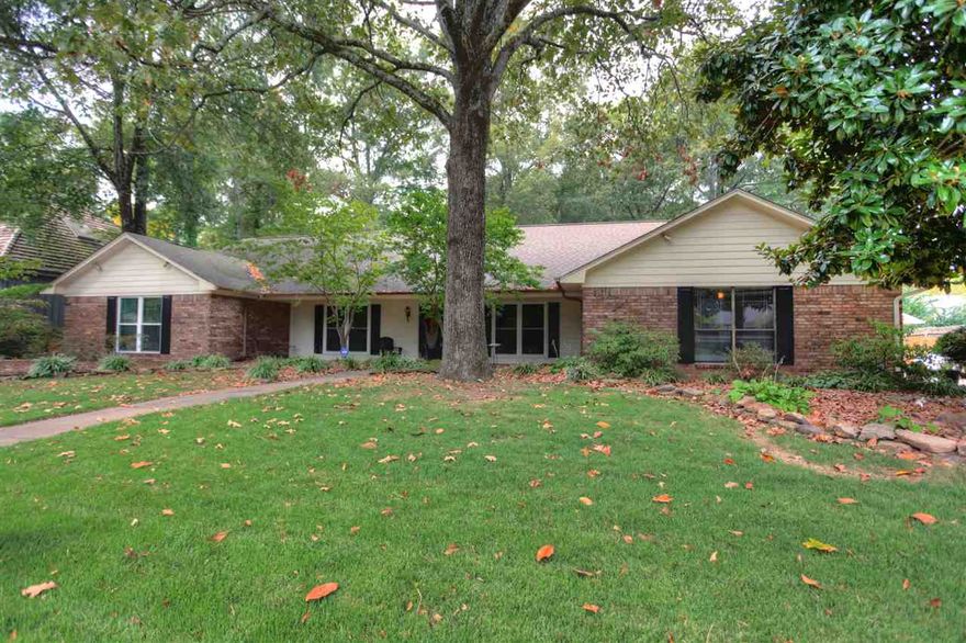 Spacious home located in an established neighborhood.  This home has 2 living areas, which are a family room and a living room, both with fireplaces.  Large bedrooms and a screened in porch.  Most windows have been updated, H/A updated, roof 6 yrs. old.  Two refrigerators to convey.  The detached garage is a 2 car or could be used for a workshop.  Extra storage in back for tools, etc.  The shaded backyard is fully fenced, has a deck and a fire pit.  See Agents Remarks.