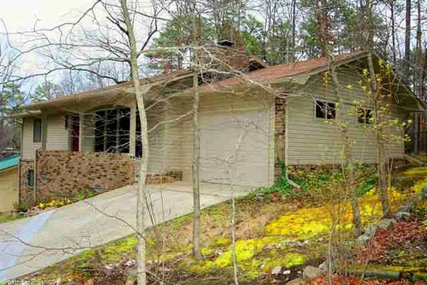 A hilltop retreat that's ultra-cute and move-in ready! This 1,212 sq.ft. 2 BD, 2 BA home was recently updated with new kitchen cabinets and countertops plus the addition of a garage and back deck. Nice, nearly level fenced backyard. Large crawlspace with space for workshop and crafts. New heat pump in 2013. Programmable hot water heater to save $. New refrigerator conveys as is. Home Warranty included.