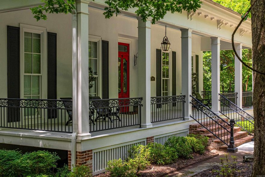 PRIVACY + ELEGANT BEAUTY DESCRIBE THIS NEW ORLEANS STYLE ESTATE with 12 ACRES and approximately 700 feet on the Mazarn River channeling into Lake Hamilton!  The flowing waters and shoals offer swimming, canoeing, fishing and tubing; the grounds and expansive covered porches provide opportunities for all outdoor activities, an outdoor wedding venue, and/or quality time with family + friends.  Indoors there are 4 private Master Suites, Formal & Private Dining with adjoining Butler's Pantry, Living Areas, a Game Room and Movie Theater - all beautifully appointed!  This site offers a gated entry, circle drive, 3-car Covered Parking, a 2 Car Garage/Shop, high-end finishes and quality construction with amenities too numerous to mention.  Just 10 Minutes from Hot Springs, restaurants, entertainment and services!
