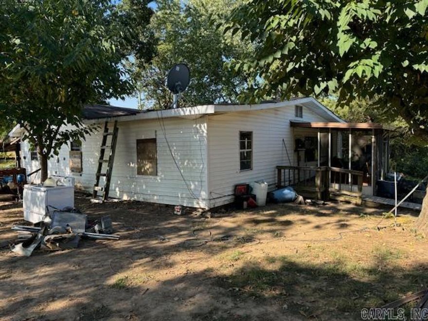 GREAT INVESTMENT PROPERTY.  Located in the Annieville area, this 3br/1ba home has 1,600 square feet with wood siding and sits on 3.5 acres.  Fixer upper needs lots of TLC.  The acreage also has an older 2br/1ba trailer that's great for storage, plus a small shed.  Located approximately 4 miles down gravel.  Secluded.