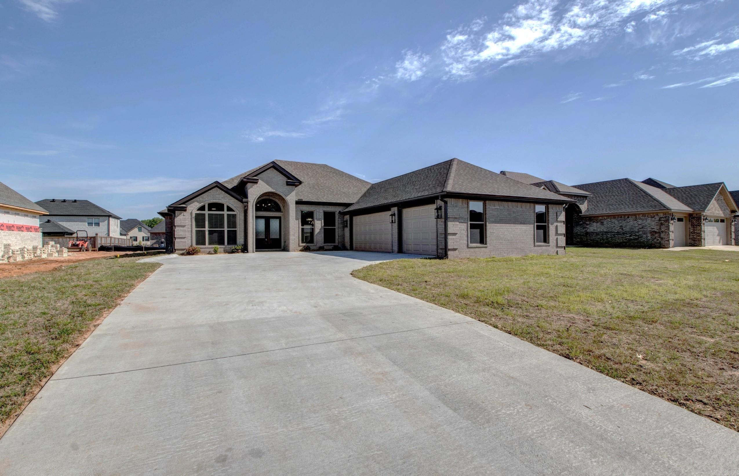 BEAUTIFUL New Construction Home on level lot! Great open floor plan with large living areas, fireplace & split bedroom plan. Spacious kitchen with tons of cabinet space granite countertops, & pantry. One of the bedrooms could be office. Large master suite with beautiful bath with double vanity, soaking tub, spa like shower & walk in closet space. You will love the covered back patio with extra privacy and large backyard.